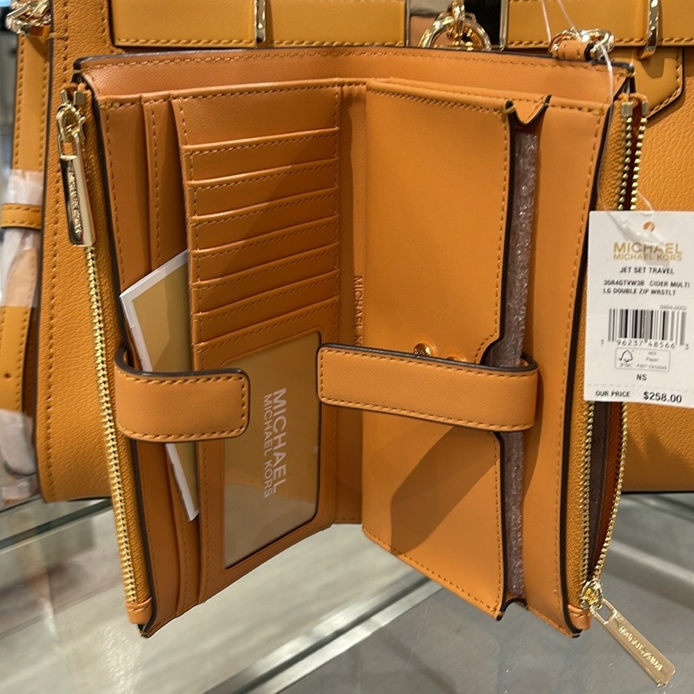 MICHAEL KORS JST LG DOUBLE ZIP WRISTLET WALLET PHONE HOLDER 
CIDER
NWT - Picture 9 of 16